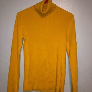 Woman’s turtle neck sweater
